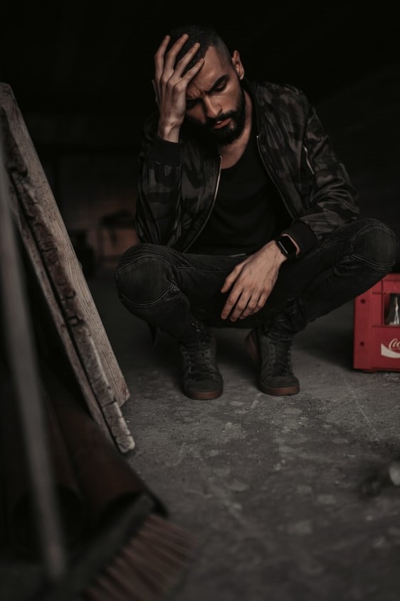 A picture containing person, sitting, man, bench

Description automatically generated